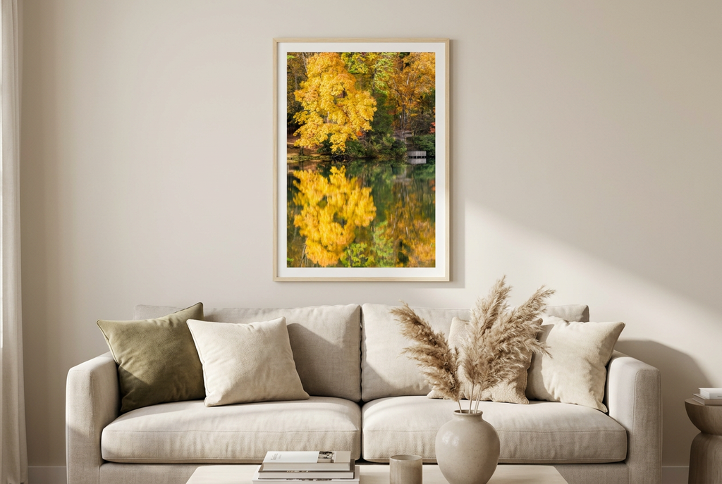 Autumn lake and wooden deck photograph in a warm living room