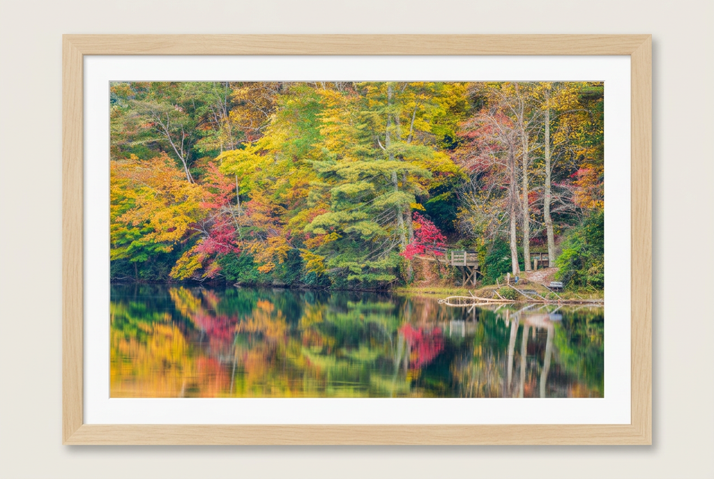 Autumn lake photograph with wood frame and white mat