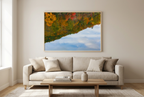 Fall foliage reflection photograph in a warm living room