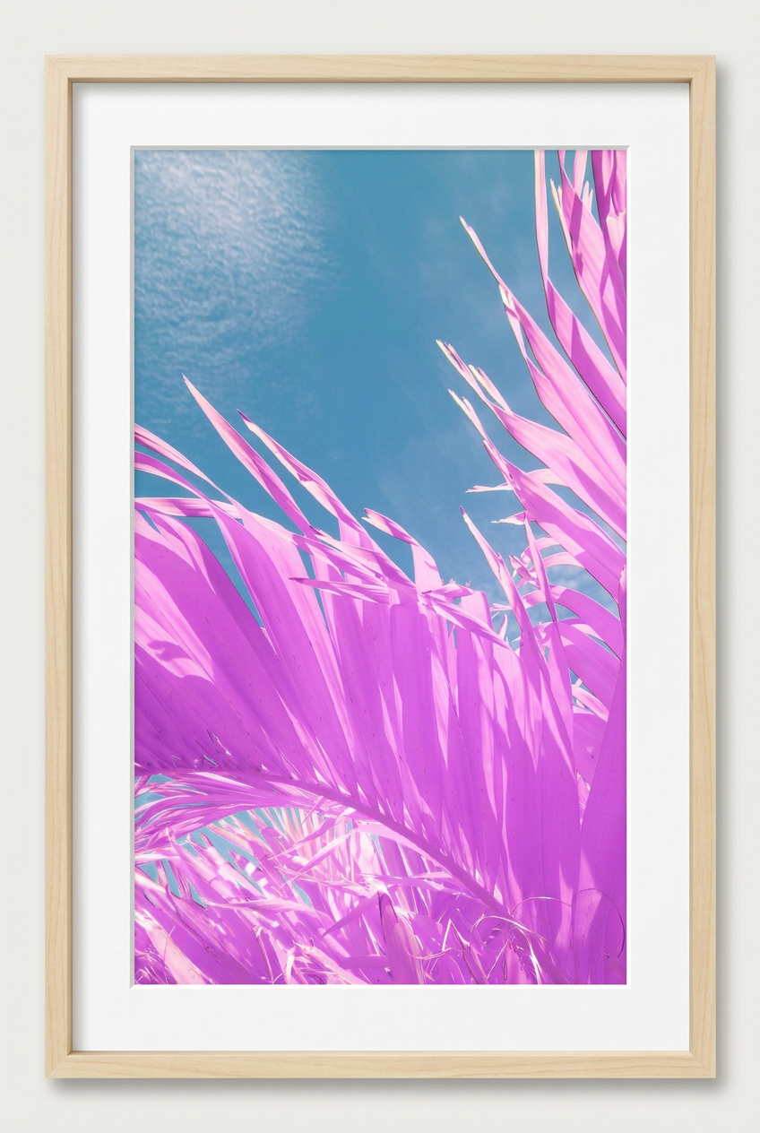 Infrared palm photograph with thicker wood frame and white mat on an off-white background